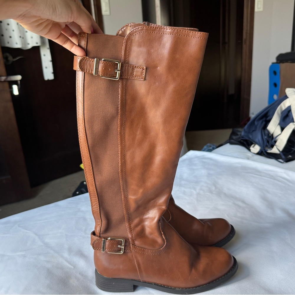 Brown leather knee high riding boots
